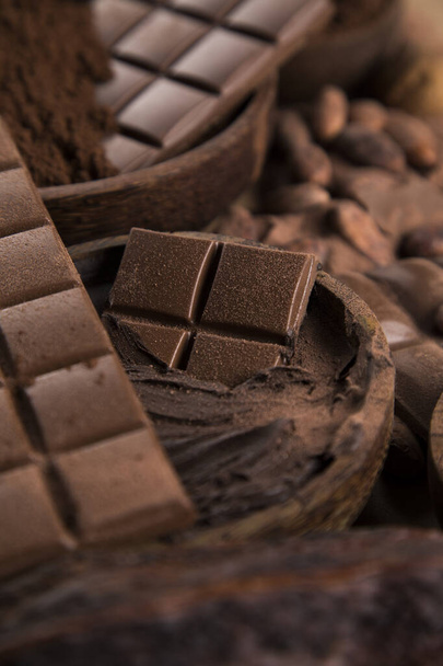 Σοκολάτα γλυκό, κακάο pod και επιδόρπιο τροφίμων φόντο - Φωτογραφία, εικόνα