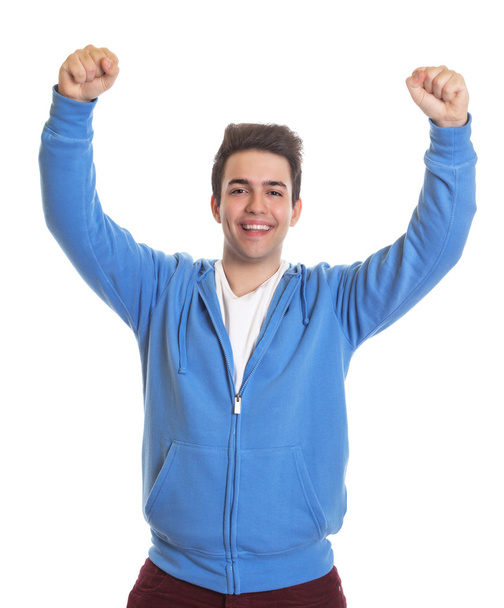 Happy hispanic guy in a blue jersey - Foto, afbeelding