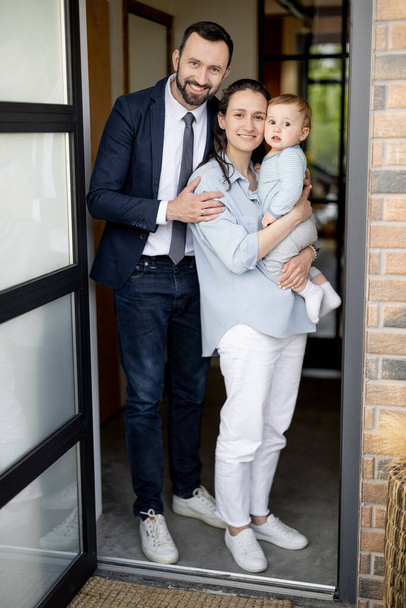A portrait of caucasian young family with baby - Fotografie, Obrázek