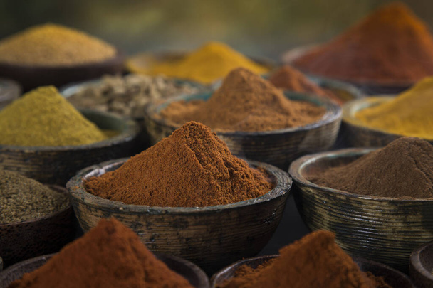 Colorful spices in bowl background - Photo, Image