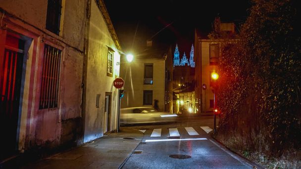 streets at night in santiago de compostela with cathedral in the background - Fotoğraf, Görsel