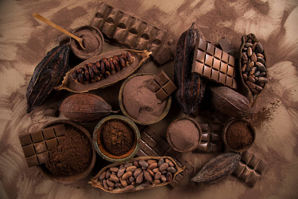 vaina de cacao y barra de chocolate y fondo de postre de alimentos - Foto, imagen