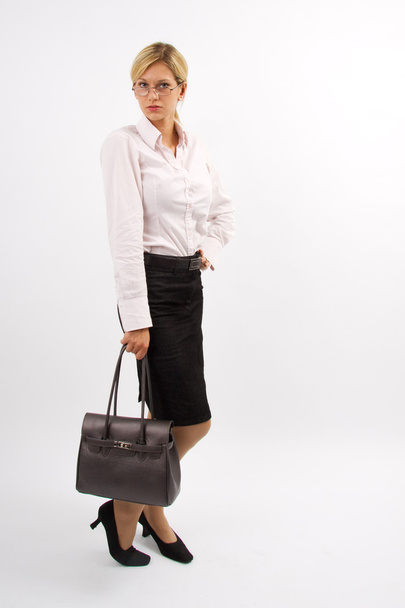 Frau in Bluse und Rock mit Handtasche - Photo, Image