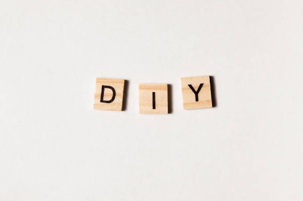 DIY - Do It Yourself. Word DIY on white background. Concept photo. - Foto, Imagem
