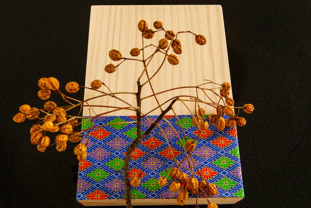Chinese festival, family reunion Mid-Autumn Festival, exquisite log gift box and dry tree - Photo, Image