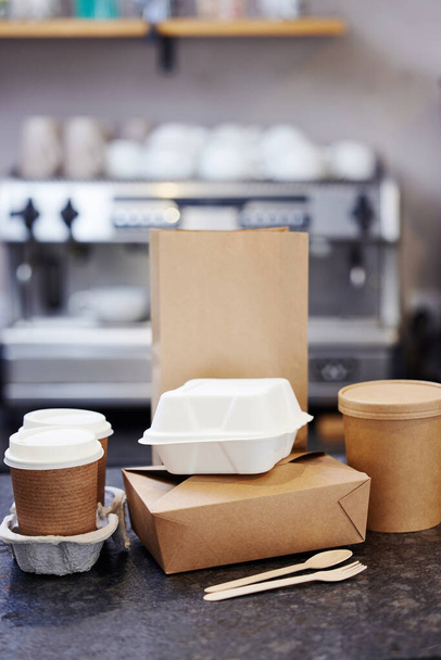 Sustainable Recyclable Takeaway Food Packaging On Counter In Coffee Shop - Fotó, kép