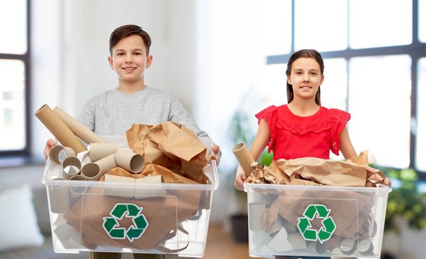 smiling girl and boy sorting paper waste - Fotoğraf, Görsel