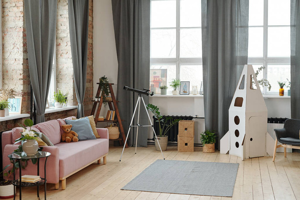 Image of modern room with toy rocket for children and kaleidoscope - Photo, Image