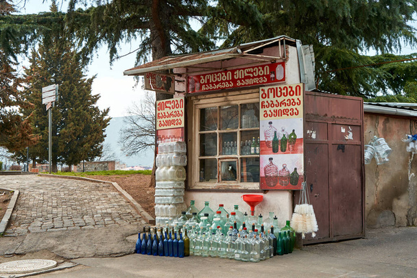 Street counter for the reception and sale of glass bottles. Tbilisi, Georgia - 03.16.2021 - Фото, изображение