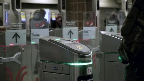 people using electronic touch card to pass through submay turnstile after green light - Footage, Video