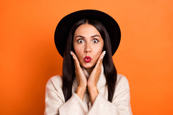 Portrait of attractive amazed woman incredible news reaction pout lips isolated over bright orange color background - Fotografie, Obrázek