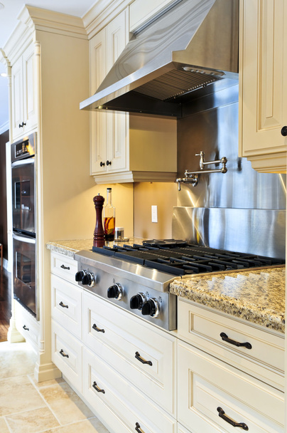 Interior of modern luxury kitchen with stainless steel appliances - Foto, Imagem