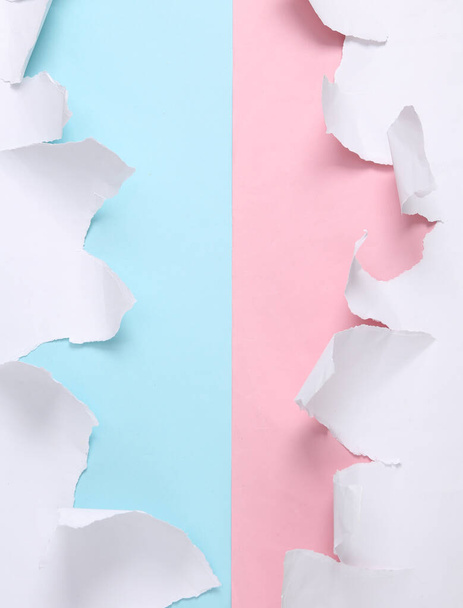 White Torn paper sheets on pink blue background. Minimalistic creative background. - Photo, Image