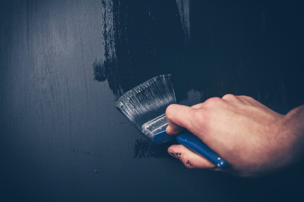 Painting a wall black - Photo, Image