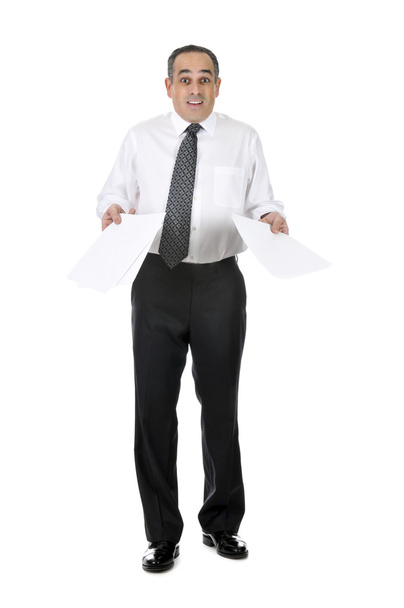 Business man in suit with confused expression holding papers - Фото, изображение