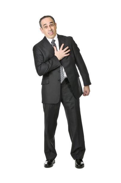 Businessman in a suit pretending to have a heart attack isolated on white background - Фото, зображення