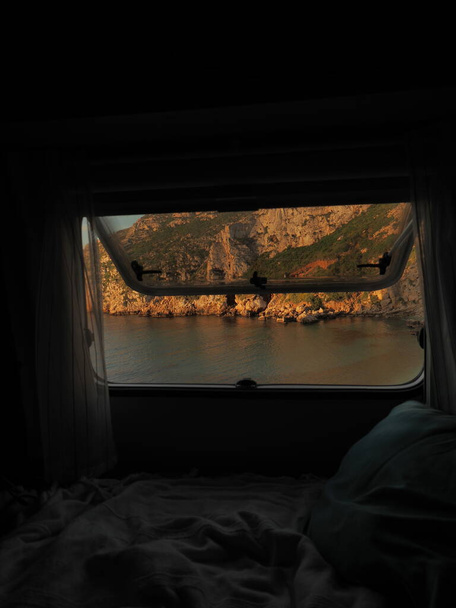 view of cala granadella from a camper window - Photo, Image