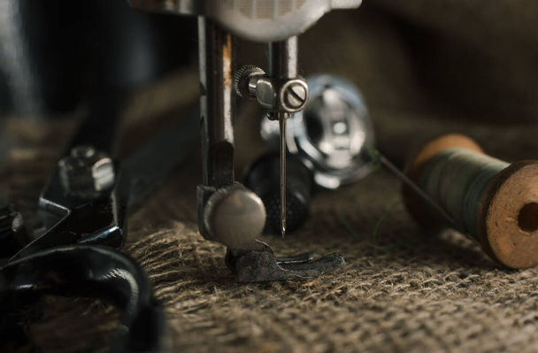 Needle and thread, scissors, sewing machine. Tailor's, fashion designer's, and seamstress's tools. Retro Sewing Tools - Valokuva, kuva