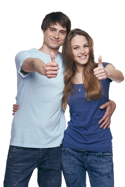 Happy couple with thumbs up - Фото, изображение