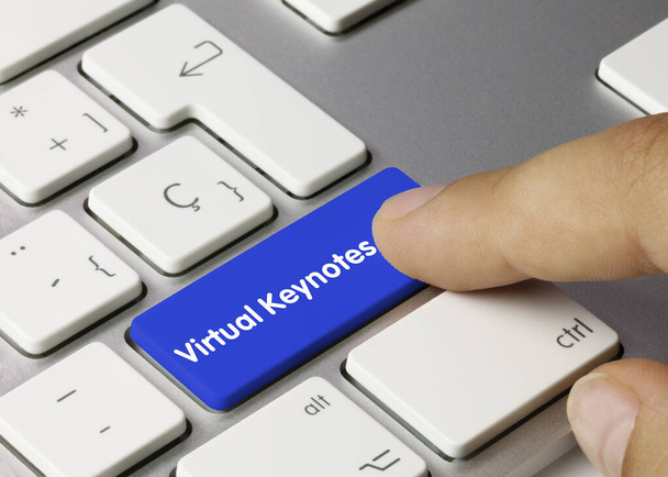 Віртуальні ключі написані на синьому ключі металевої клавіатури. Клавіша натискання пальця
. - Фото, зображення