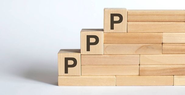 Pracovní strategie pro dřevěné bloky PPP na bílém pozadí - Fotografie, Obrázek