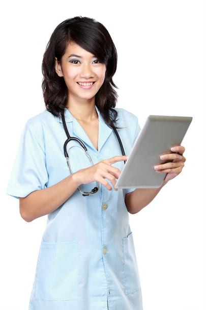 young nurse smiling while working - Foto, Imagen