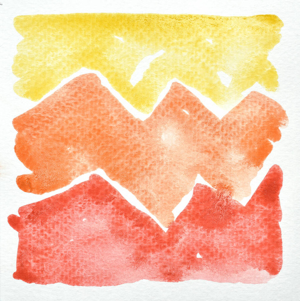 a photo image of abstract red orange and yellow watercolor on paper, hand paint of red orange and yellow watercolor gradient for background, wet technique on paper to mix difference color - Fotoğraf, Görsel