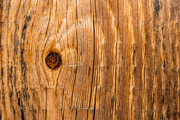 Vecchia parete di legno con nodi. Vista da vicino - Foto, immagini
