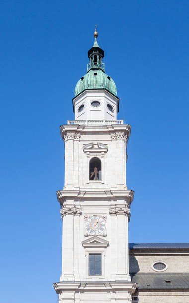 A bell tower of Salzburg Cathedral in Austria.  The Roman Catholic cathedral was built in a Baroque style. - Foto, Bild