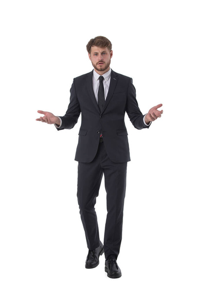 Young handsome business man wearing suit clueless and confused expression. Doubt concept. - Fotoğraf, Görsel