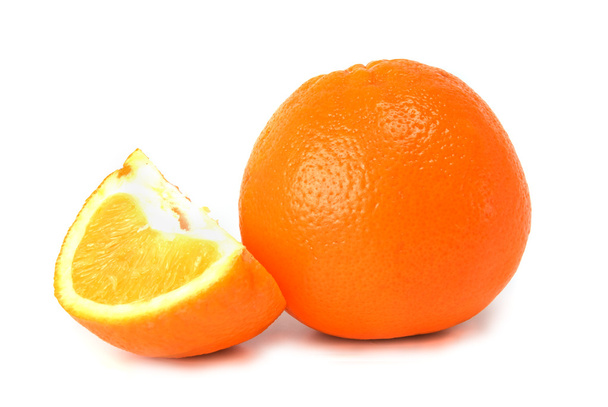 Orange and segments against white background - Foto, imagen