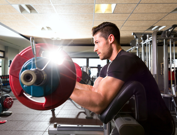 biceps preacher bench arm curl workout man at gym - Φωτογραφία, εικόνα