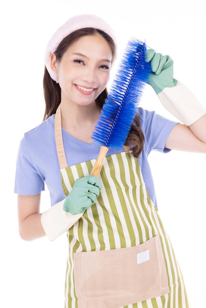 Portrait of young Asian woman wearing green rubber gloves for hands protection during cleaning isolated over white background. - Fotoğraf, Görsel