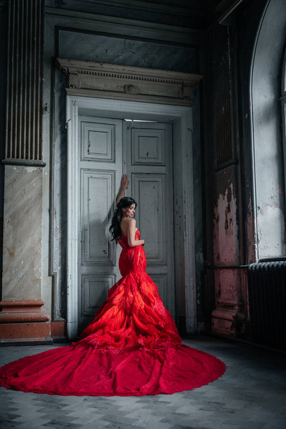 Woman Vintage Red Dress Old Castle Beautiful Princess In Seductive Dress Elegant Caucasian Female Fairy Tale story - Zdjęcie, obraz
