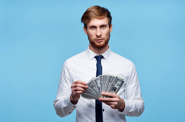 business man in shirt with tie bundle of money in the hands of the office - Foto, Imagem