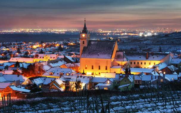 Small town in Slovakia - Svaty Jur at night in winter - Фото, изображение