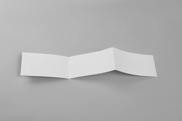 Blank paper brochure on light grey background. Mockup for design - Zdjęcie, obraz