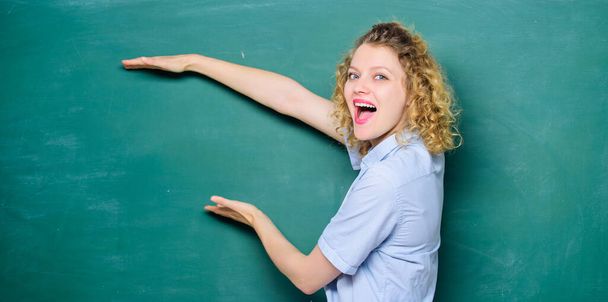 Important information to remember. Teacher best friend of learners. Good teacher master of simplification. Teaching could be more fun. Woman teacher in front of chalkboard. Teacher explain hard topic - Photo, image