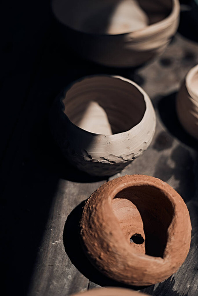 workshop production of ceramic tableware finished products - Φωτογραφία, εικόνα