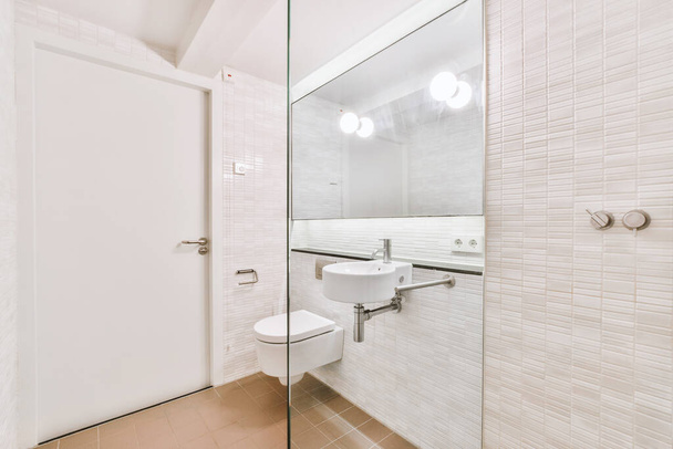 Interior of bathroom with tiled walls - Photo, Image
