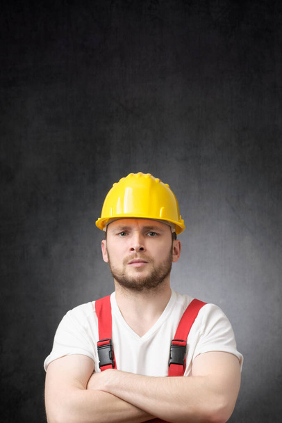 Annoyed construction worker with his arms crossed - Photo, Image
