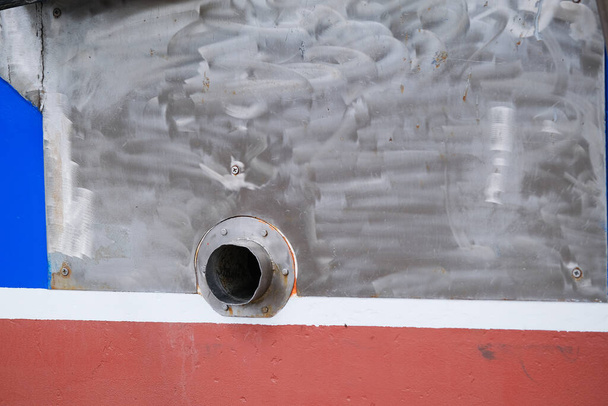 Steel tank with large drain fitted to inshore trawler.  - Photo, Image