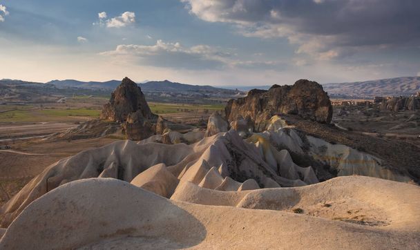 valleys of Cappadocia with quaint cliffs and mountains in Turkey - Fotó, kép