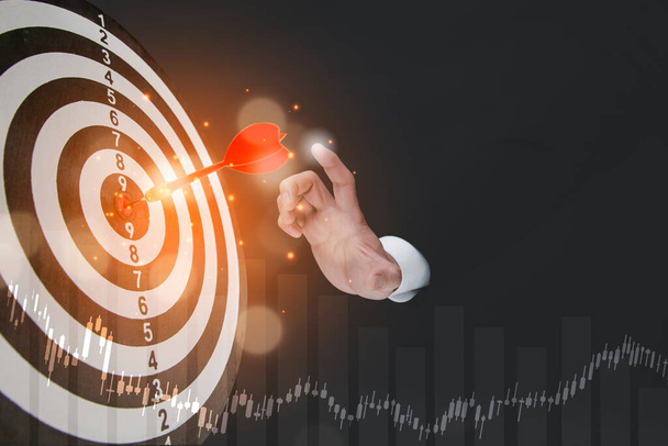Targeting the business concept, Businessman throwing red arrow dart to virtual target dart board,Executive marketing, investment goal and target for business investment concept. - Photo, Image