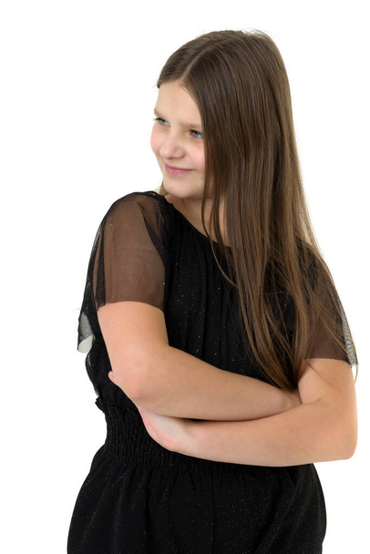 Cute girl posing in black jumpsuit - Фото, изображение
