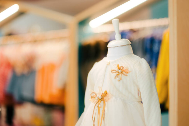 Formal Holiday Dress Presented in Children Fashion Clothing Store - 写真・画像