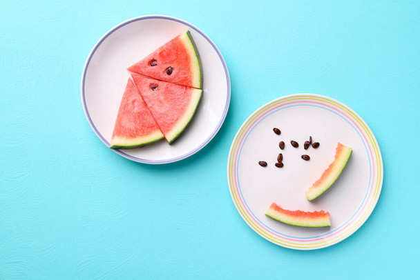 Sliced watermelon fruits with bite and seeds on plate, Tropical fruit, Summer season - Valokuva, kuva