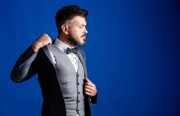 businessman with beard in tie. mature illusionist. Bride groom ready for wedding. esthete. stylish art director. business in modern life. bearded man in formal tuxedo suit. Perfection in every detail - Foto, imagen
