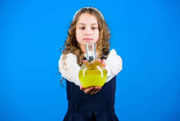science research in lab. Small school girl. education and knowledge. Future. child study bilogy lesson. back to school. small girl scientist with testing flask. Concentrated on studying - Zdjęcie, obraz