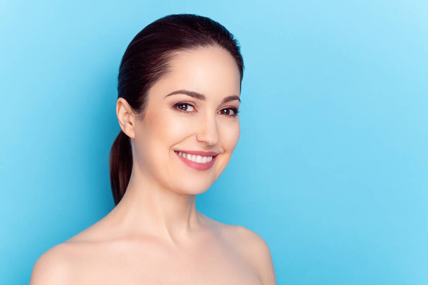 Photo of young woman happy positive smile perfect silky skin spa cream isolated over blue color background - Φωτογραφία, εικόνα